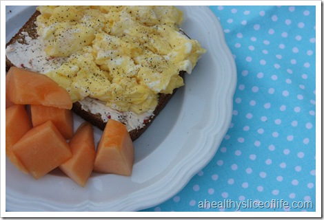 scrambled eggs on toast and cantaloupe