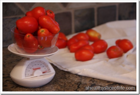 weighing tomatoes