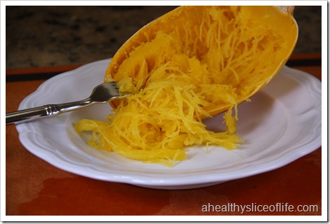 how to cook a spaghetti squash- scrape out the inside