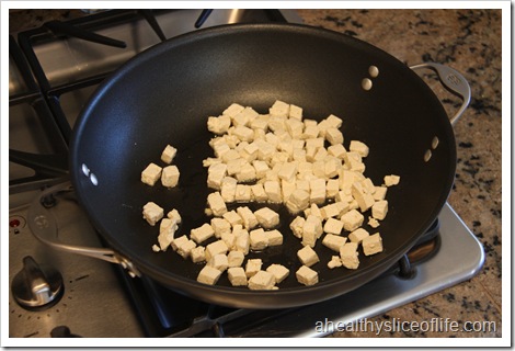 Eating Well Tofu and Broccoli Stir-fry - tofu in hot oil