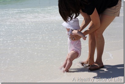 Destin Hailey toes in ocean