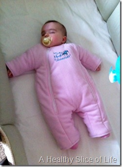 baby sleeping in Baby Merlin's Magic Sleepsuit