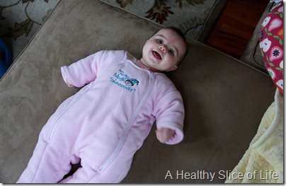 baby wearing the Baby Merlin's Magic Sleepsuit