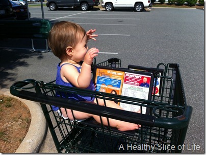 Hailey 11 months old- sideways in cart