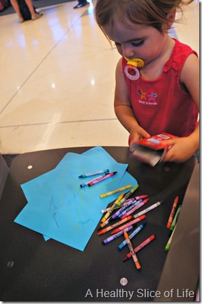 toddler on airplane- crayons