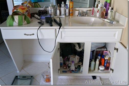 home organization challenge- her bathroom cabinet- before 