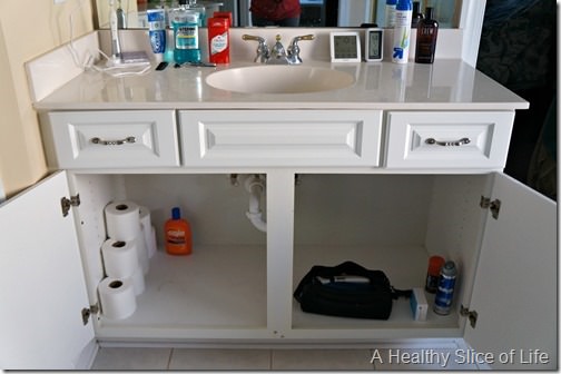 home organization challenge- his bathroom cabinet- after