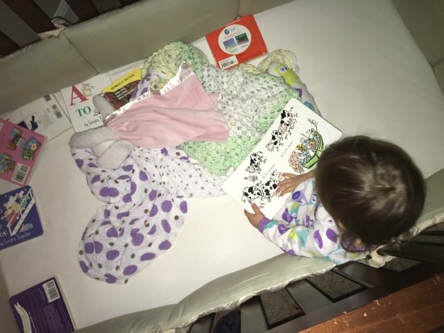 toddler books in crib