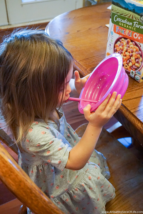 toddler drinking cereal milk