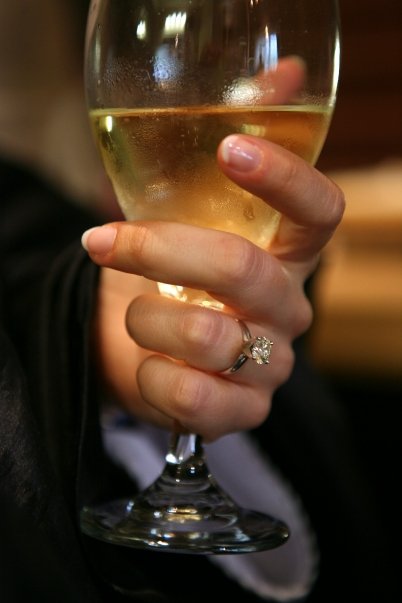 engagement ring and wine