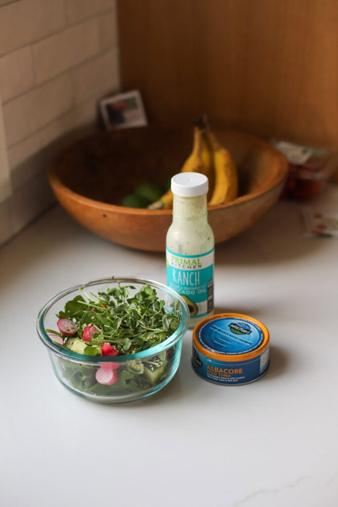 Salad with a can of tuna fish